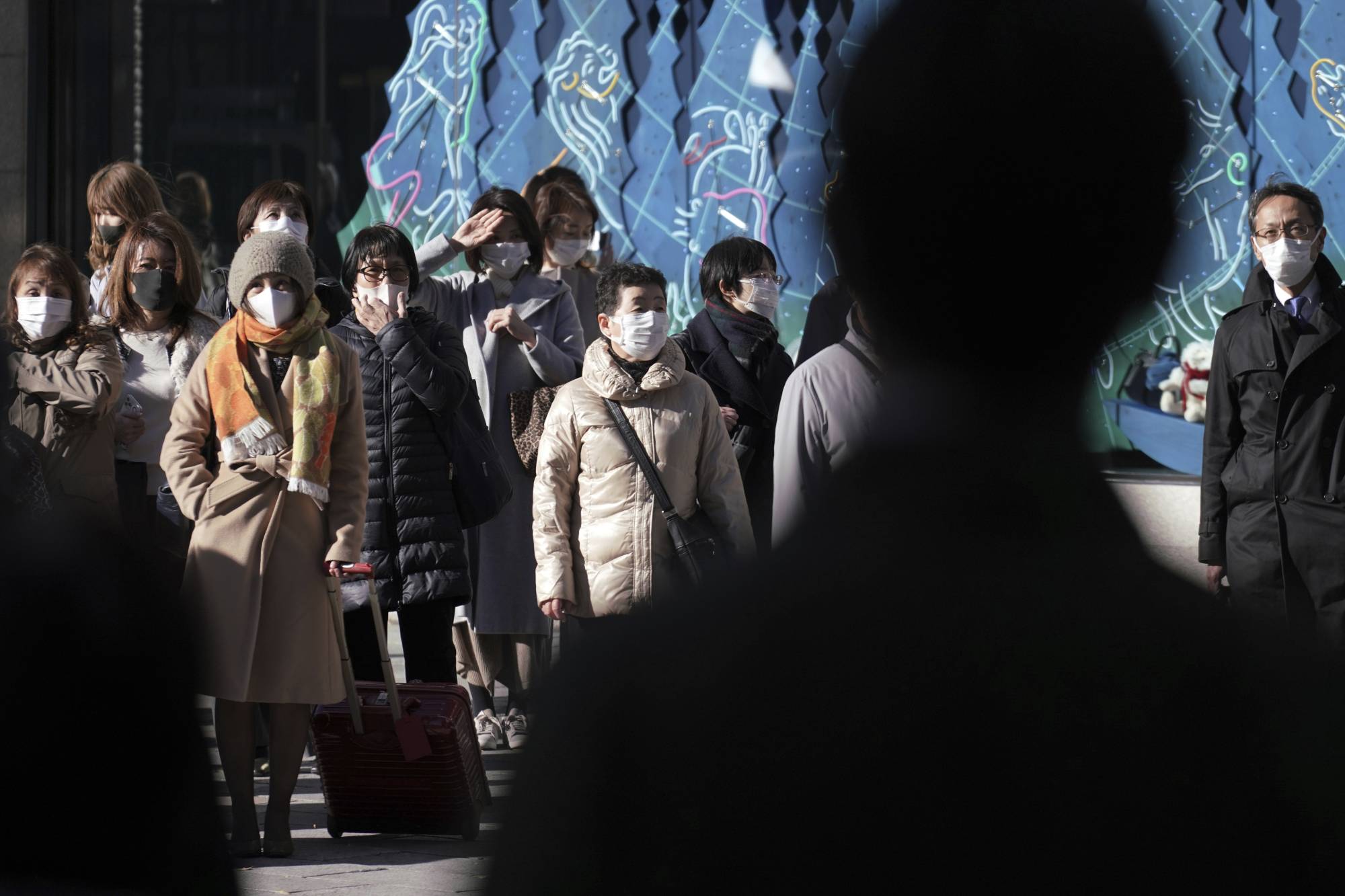 As coronavirus cases rise in Japan, the Ginza shopping district of Tokyo has played host to a series of high-tech hand-washing stations set up by WOTA Corp. | AP