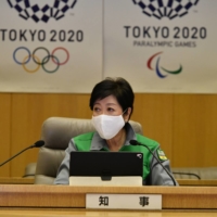 Tokyo Gov. Yuriko Koike attends a coronavirus meeting Monday at the Tokyo Metropolitan Government. | RYUSEI TAKAHASHI
