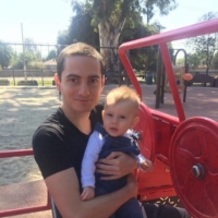 American sperm donor Kyle Gordy with one of the children he fathered. | COURTESY OF KYLE GORDY