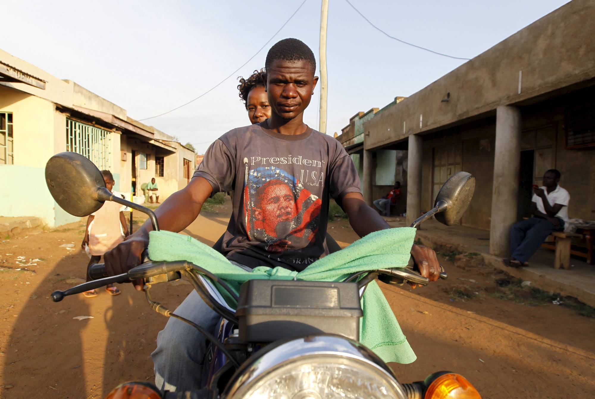 A motorcycle taxi in Kogelo, Kenya, in 2015. Electric motorbike startups have sprung up across East Africa in the past two years to supply and manage the motorbike-taxi drivers who run the most common form of public transport in most cities. | REUTERS