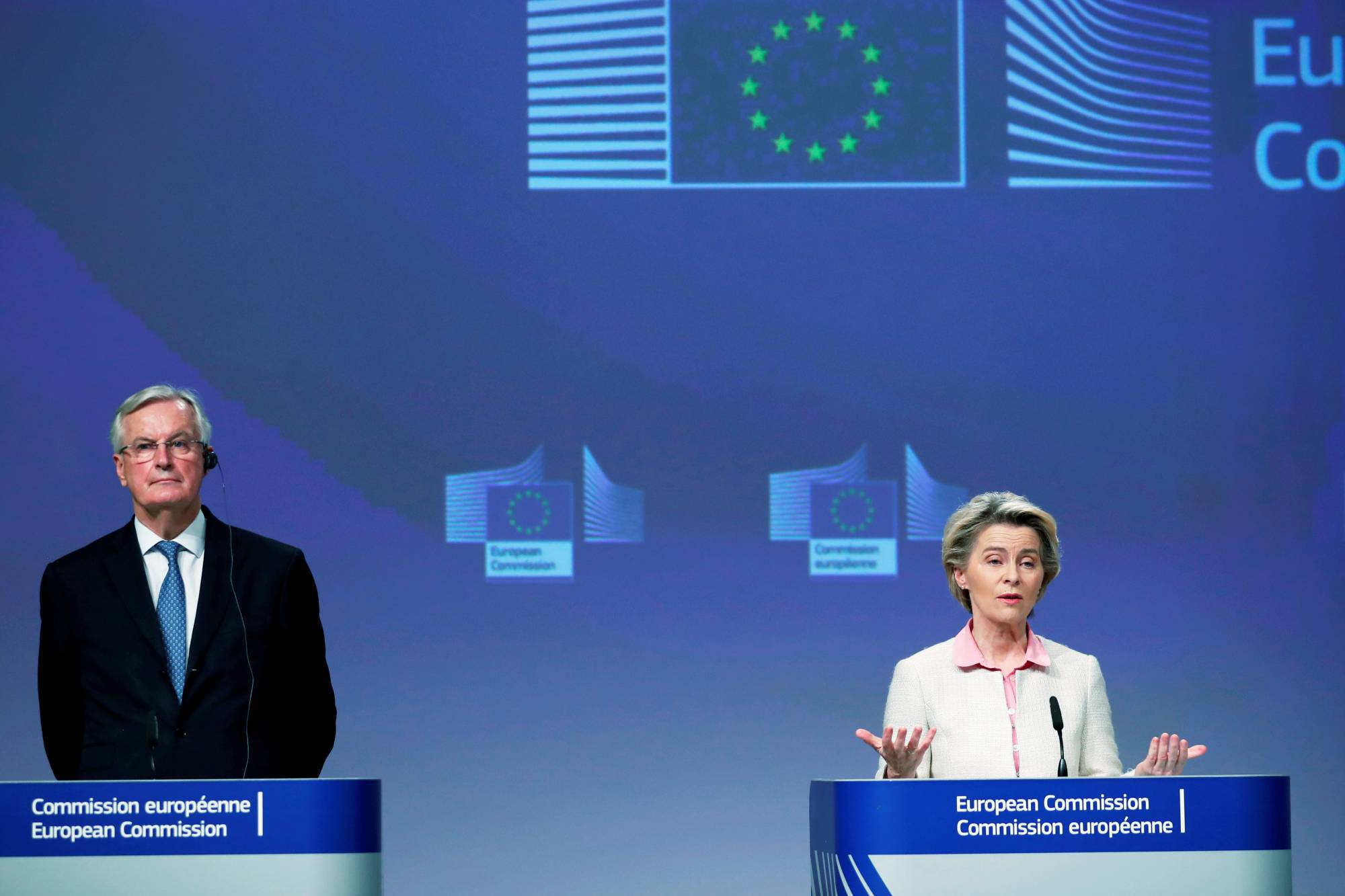 European Commission President Ursula von der Leyen gives a statement on the outcome of the Brexit talks next to the European Union's chief Brexit negotiator, Michel Barnier, in Brussels on Thursday. | Pool via REUTERS