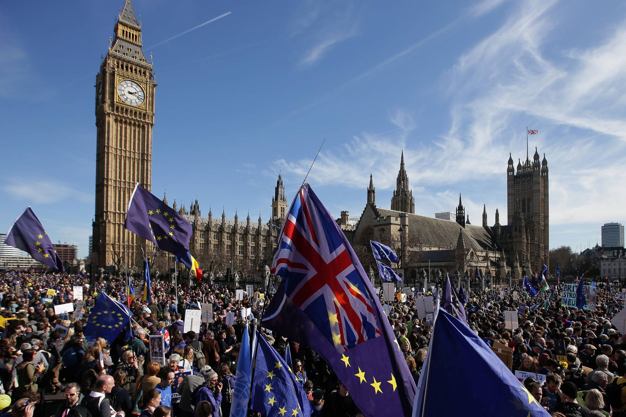 Demonstrators gather in front of the Houses of Parliament in London following an anti-Brexit, pro-European Union march in March 2017. | AFP-JIJI