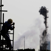 A trade ministry report released Friday designates 14 industries in which significant growth and investment are key to achieve decarbonization. | REUTERS