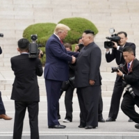 U.S. President Donald Trump meets with North Korean leader Kim Jong Un at the demilitarized zone separating the two Koreas, in Panmunjom, South Korea, in June 30, 2019. | REUTERS 