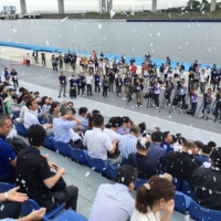 Tokyo 2020 organizers test artificial snowfall meant to cool down spectators during a canoe event at Sea Forest Waterway in Tokyo on Sept. 13, 2019. | REUTERS