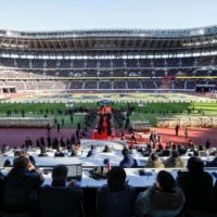 Vissel Kobe and Kashima Antlers players take the pitch at National Stadium for the Emperor\'s Cup final, which also served as a Tokyo 2020 test event, on Jan. 1. | REUTERS