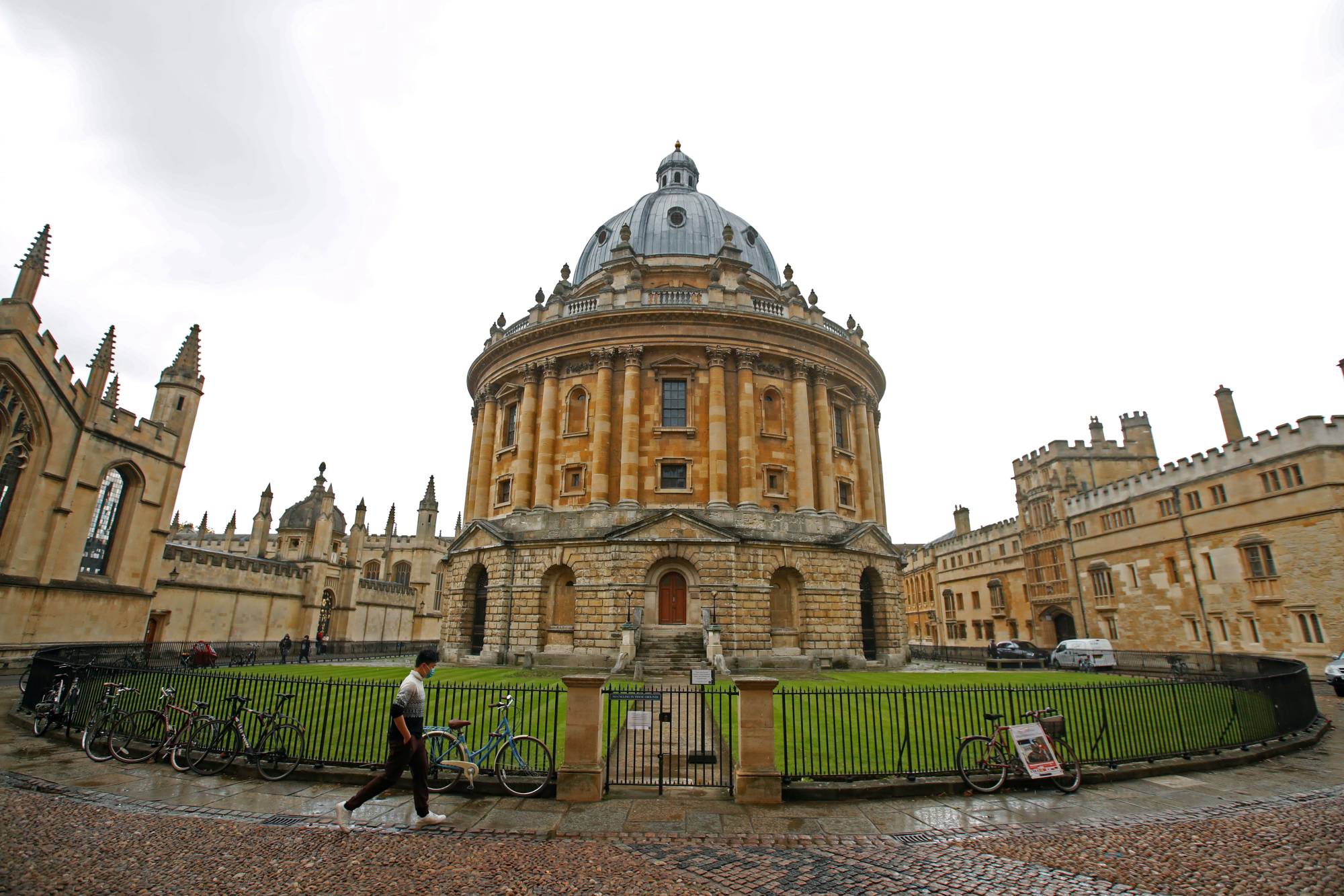 Oxford University and AstraZeneca are hoping for quick authorization of their COVID-19 vaccine by Britain's regulator. But questions about the trial and the results won't go away. | REUTERS 
