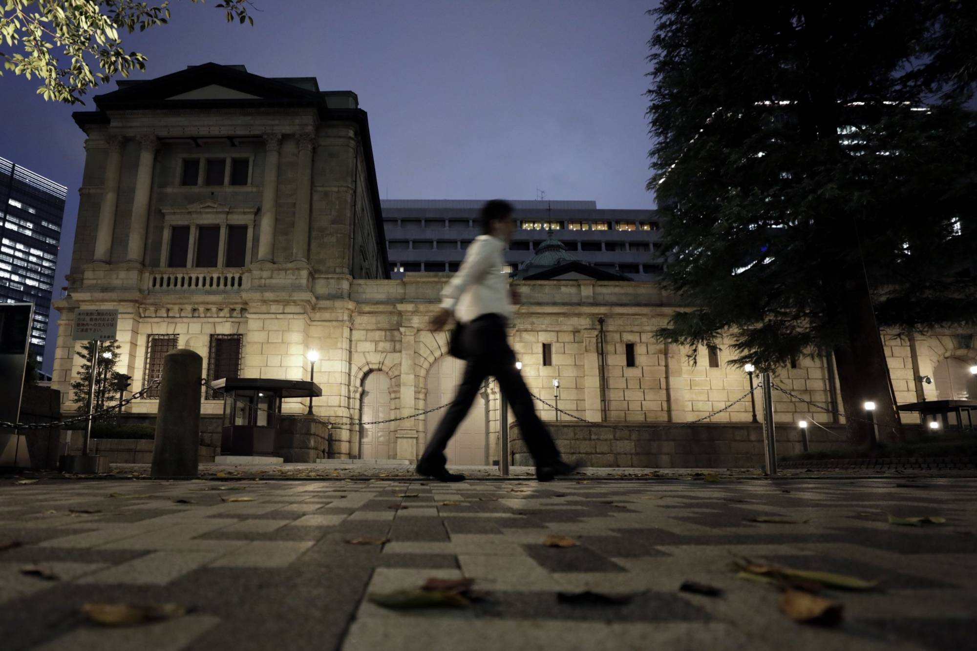 Experts say the Bank of Japan’s exit strategy from its ultraeasy monetary policy will be a grueling issue, with the central bank’s ballooning balance sheet likely to pose a risk to the country’s fiscal sustainability. | BLOOMBERG 