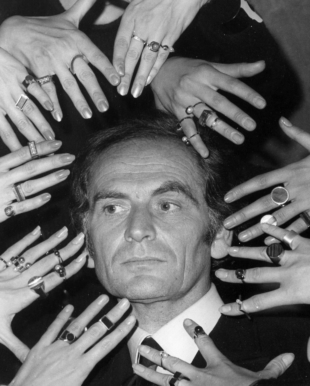 Cardin with an assortment of rings from his latest jewelry collection in Paris in 1969 | AP