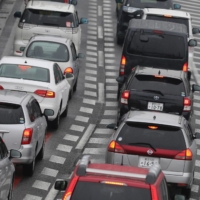 Tokyo Gov. Yuriko Koike has said the capital will ban the sales of new gasoline cars by 2030. | BLOOMBERG