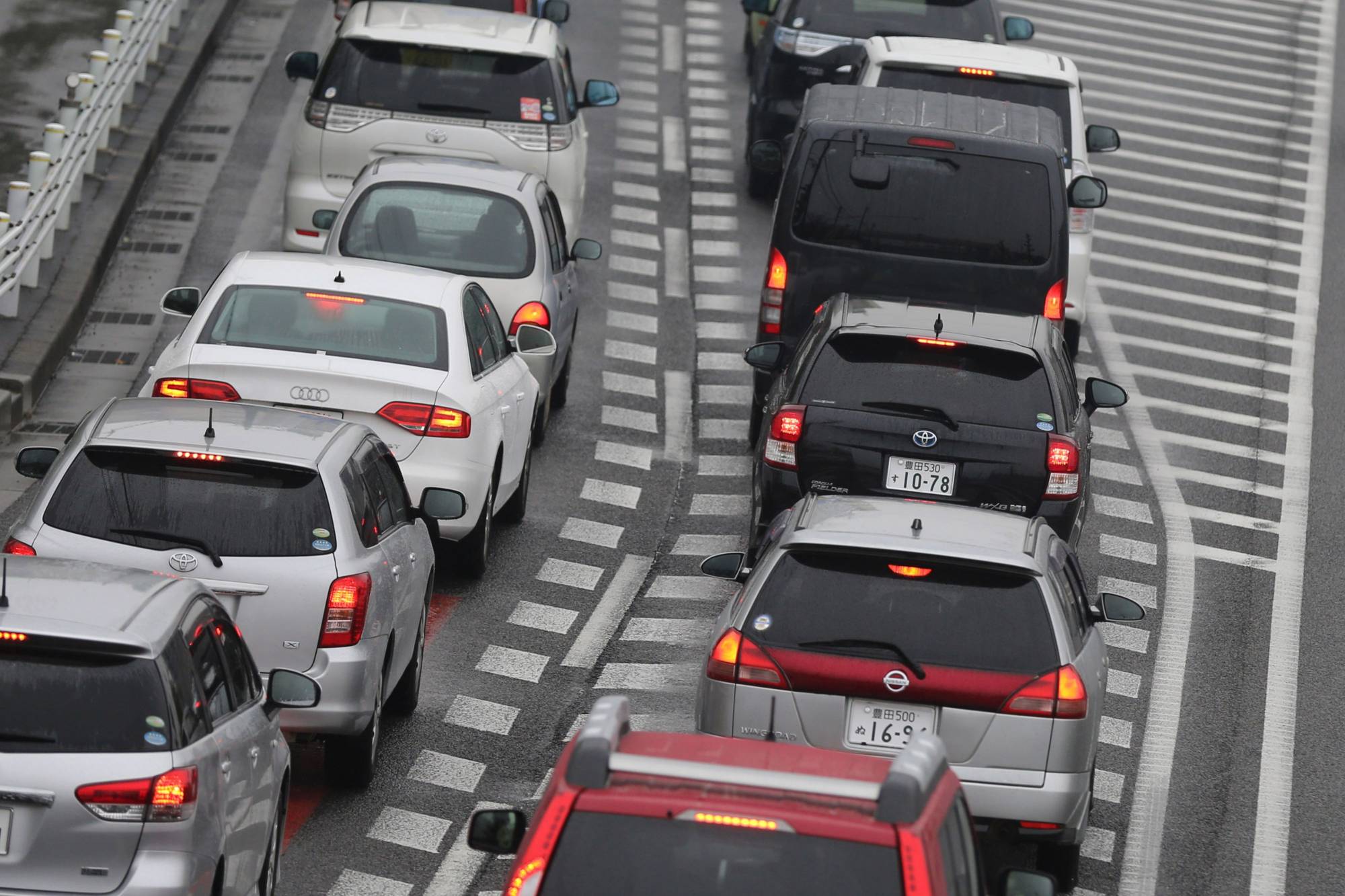 Tokyo Gov. Yuriko Koike has said the capital will ban the sales of new gasoline cars by 2030. | BLOOMBERG