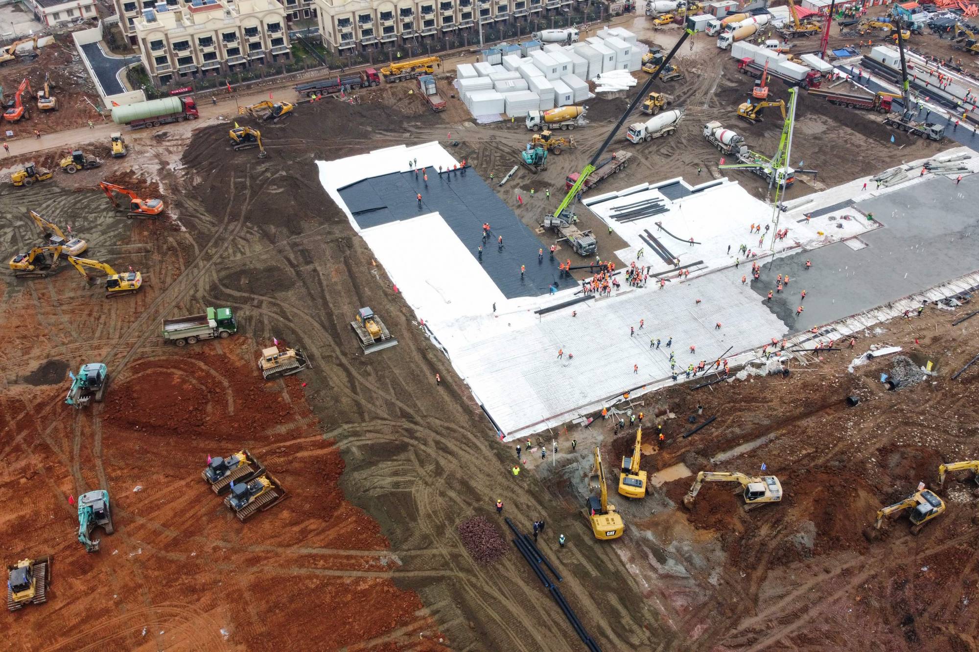 The construction site of a hospital being built to treat COVID-19 patients in Wuhan in January. | AFP-Jiji