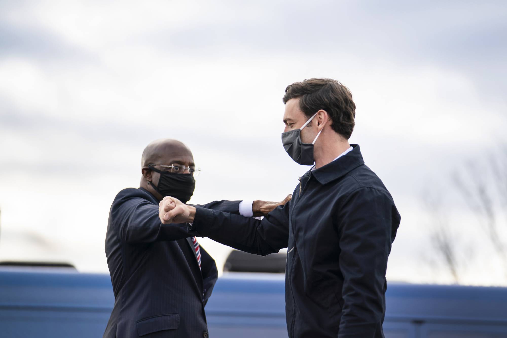 The Rev. Raphael Warnock (left) and Jon Ossoff, the Democratic Senate candidates in Georgia, at a campaign rally in Stonecrest, Georgia on Monday | NICOLE CRAINE / THE NEW YORK TIMES