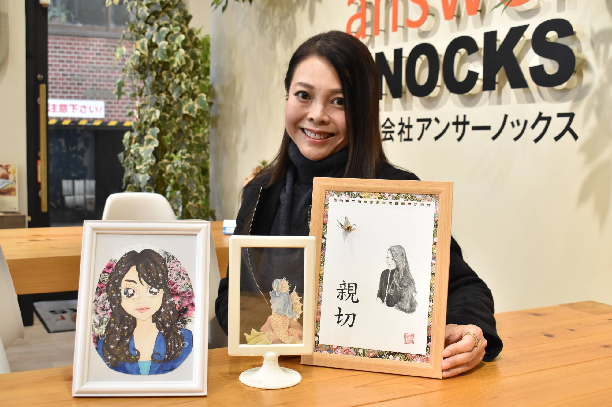 Kaori Watanabe, president of Kofu-based temporary staffing agency Answer Knocks, says three different versions of her own portraits, drawn by the three artists, immediately went viral online, helping spread word of their predicament and triggering an outpouring of goodwill and generosity from across the nation. | TOMOHIRO OSAKI 
