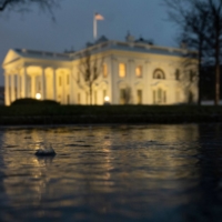 Rain is seen falling near the White House in Washington on Friday. | AFP-JIJI