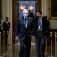 Senate Majority Leader Mitch McConnell is seen at the Capitol in Washington on Friday. The Senate voted overwhelmingly the same day to override President Donald Trump’s veto of the annual military policy bill, mustering bipartisan support to enact the legislation over the president’s objections and delivering him the first such legislative rebuke of his presidency. | STEFANI REYNOLDS/THE NEW YORK TIMES