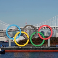 The Olympic rings are reinstalled at Odaiba Marine Park in Tokyo on Dec. 1, 2020.  | REUTERS