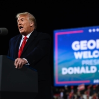U.S. President Donald Trump speaks at a rally to support Republican Senate candidates at Valdosta Regional Airport in Valdosta, Georgia, on Dec. 5. Trump pressured the Georgia secretary of state in an extraordinary phone conversation Saturday to \"find\" enough votes to overturn Joe Biden\'s victory in the Southern state, media reported Sunday. | AFP-JIJI