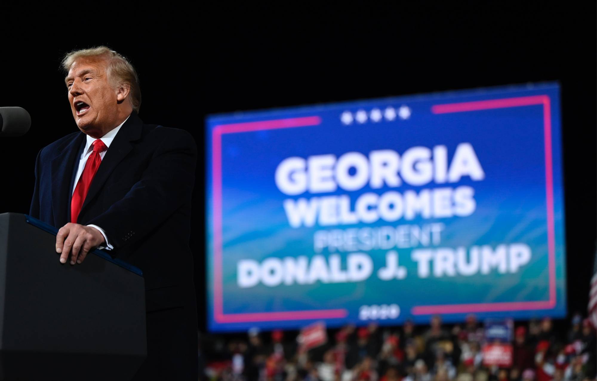 U.S. President Donald Trump speaks at a rally to support Republican Senate candidates at Valdosta Regional Airport in Valdosta, Georgia, on Dec. 5. Trump pressured the Georgia secretary of state in an extraordinary phone conversation Saturday to 'find' enough votes to overturn Joe Biden's victory in the Southern state, media reported Sunday. | AFP-JIJI