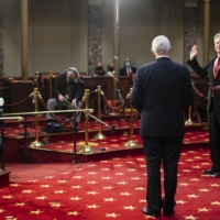 Republican Sen. Roger Marshall is ceremonially sworn in by Vice President Mike Pence in the Old Senate Chamber of the U.S. Capitol in Washington on Sunday. Among those planning to try to reverse the count were four incoming Republican senators, including Marshall. | PETE MAROVICH / THE NEW YORK TIMES
