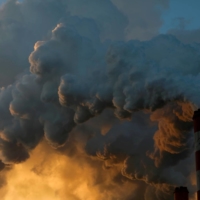 Smoke and steam billow from the Belchatow Power Station, Europe\'s largest coal-fired power plant, near Belchatow, Poland. The most significant climate law last year was the EU setting a legally binding target to reach net-zero emissions by 2050. | REUTERS