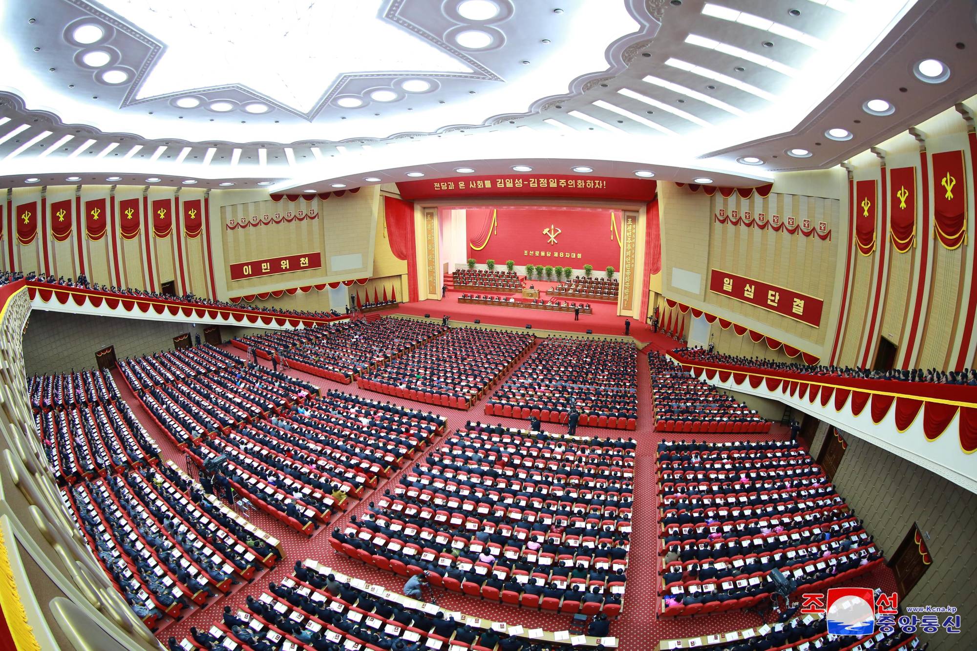 Officials attend the first day of the 8th Congress of North Korea's ruling Workers' Party of Korea in Pyongyang on Tuesday. | KCNA / VIA REUTERS