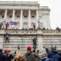 Supporters of President Donald Trump storm the Capitol in Washington on Wednesday. | JASON ANDREW / THE NEW YORK TIMES)