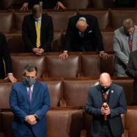 Republican members of Congress pray after U.S. Vice President Mike Pence declared the final Electoral College vote counts making Joe Biden the next U.S. President during a joint session of Congress at the Capitol in Washington on Thursday. | AFP-JIJI