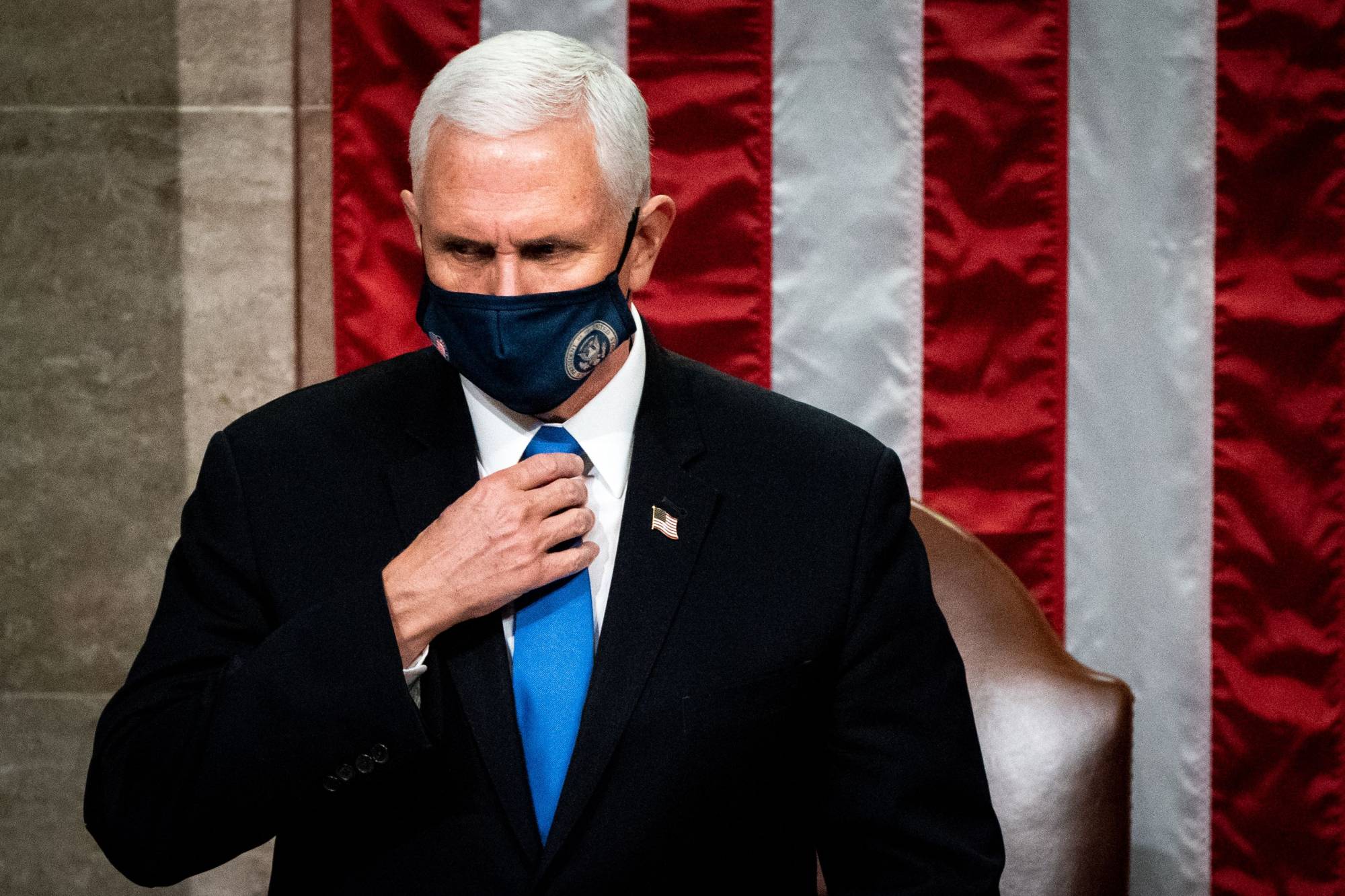 U.S. Vice President Mike Pence presides over a joint session of Congress to certify the 2020 Electoral College results in Washington on Wednesday. | POOL / AFP-JIJI