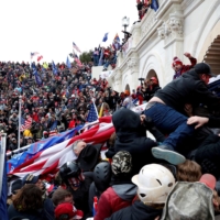 Pro-Trump rioters storm into the U.S. Capitol during clashes with police in Washington on Wednesday.  | REUTERS 