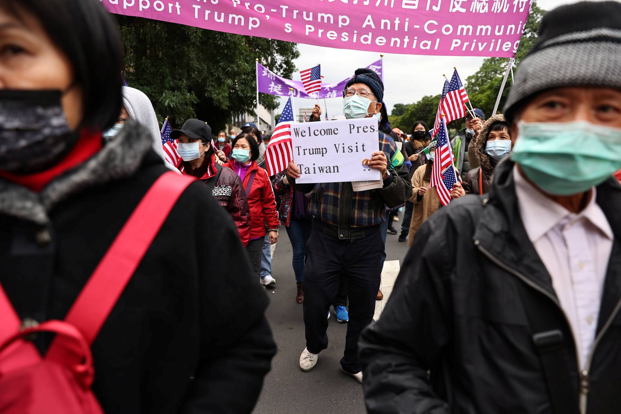 Supporters of Taiwan independence hold a rally in support of U.S. President Donald Trump in Taipei on Jan. 2. | REUTERS