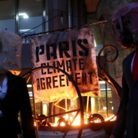 Ocean Rebellion protesters demonstrate outside the International Maritime Organisation headquarters in London in November. Britain and countries in the European Union in December committed to stronger emissions reductions targets for 2030. | REUTERS