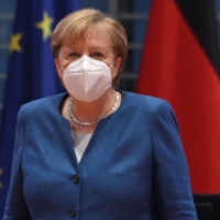German Chancellor Angela Merkel arrives to lead the weekly Cabinet meeting at the Chancellery in Berlin on Wednesday. | POOL / VIA REUTERS