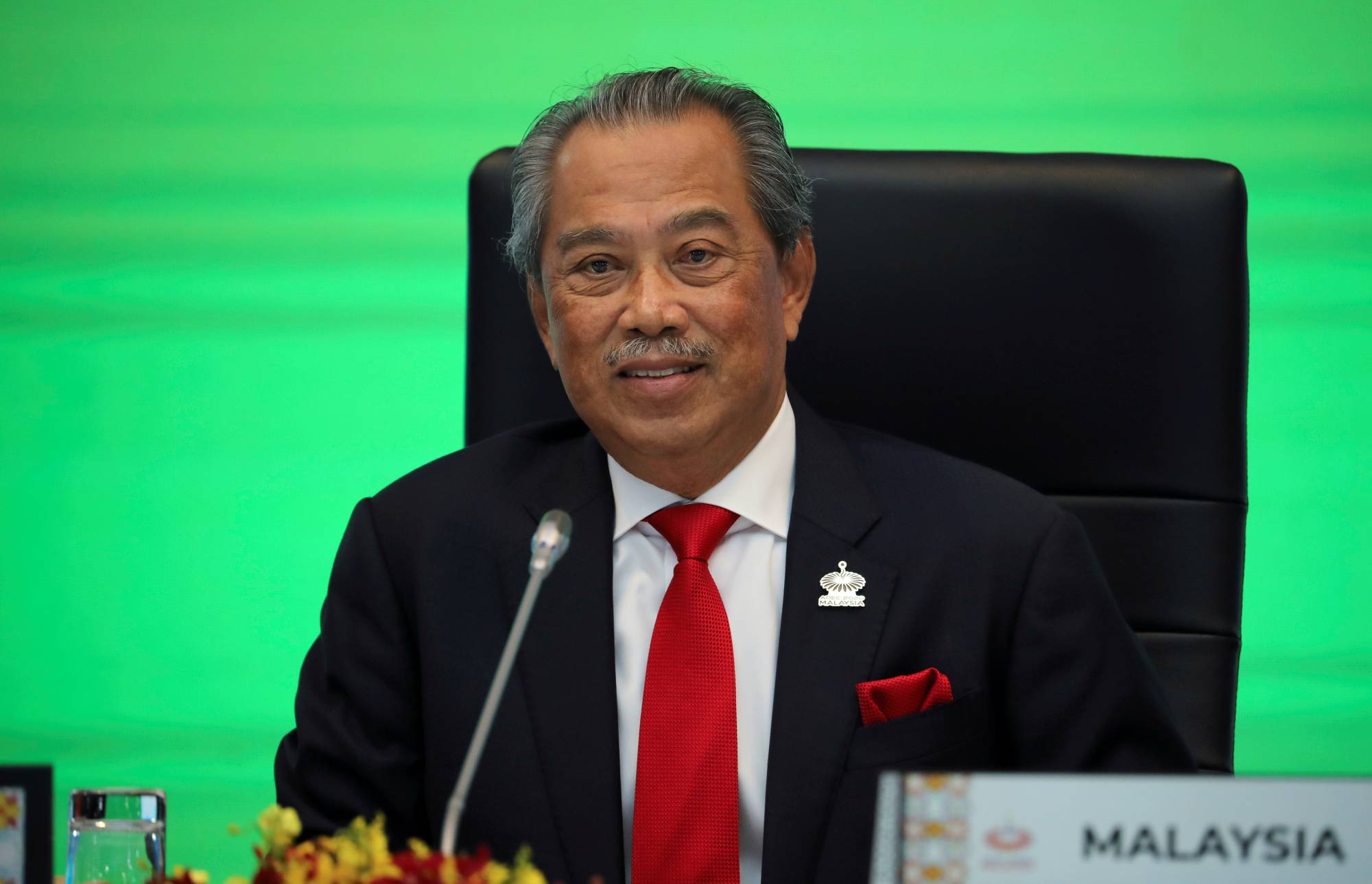 Malaysian Prime Minister Muhyiddin Yassin speaks during the virtual APEC Economic Leaders Meeting in Kuala Lumpur in November.  | REUTERS 