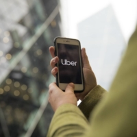 COVID-19 lockdowns continue to depress ride-sharing demand, hitting on Uber Technologies Inc.\'s business, but the food-delivery business has surged during the pandemic, making up for much of that loss. | BLOOMBERG