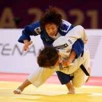 Yoko Ono (above) fights Russia\'s Madina Taimazova in the women\'s 70-kg final at the World Judo Masters in Doha on Tuesday. | AFP-JIJI