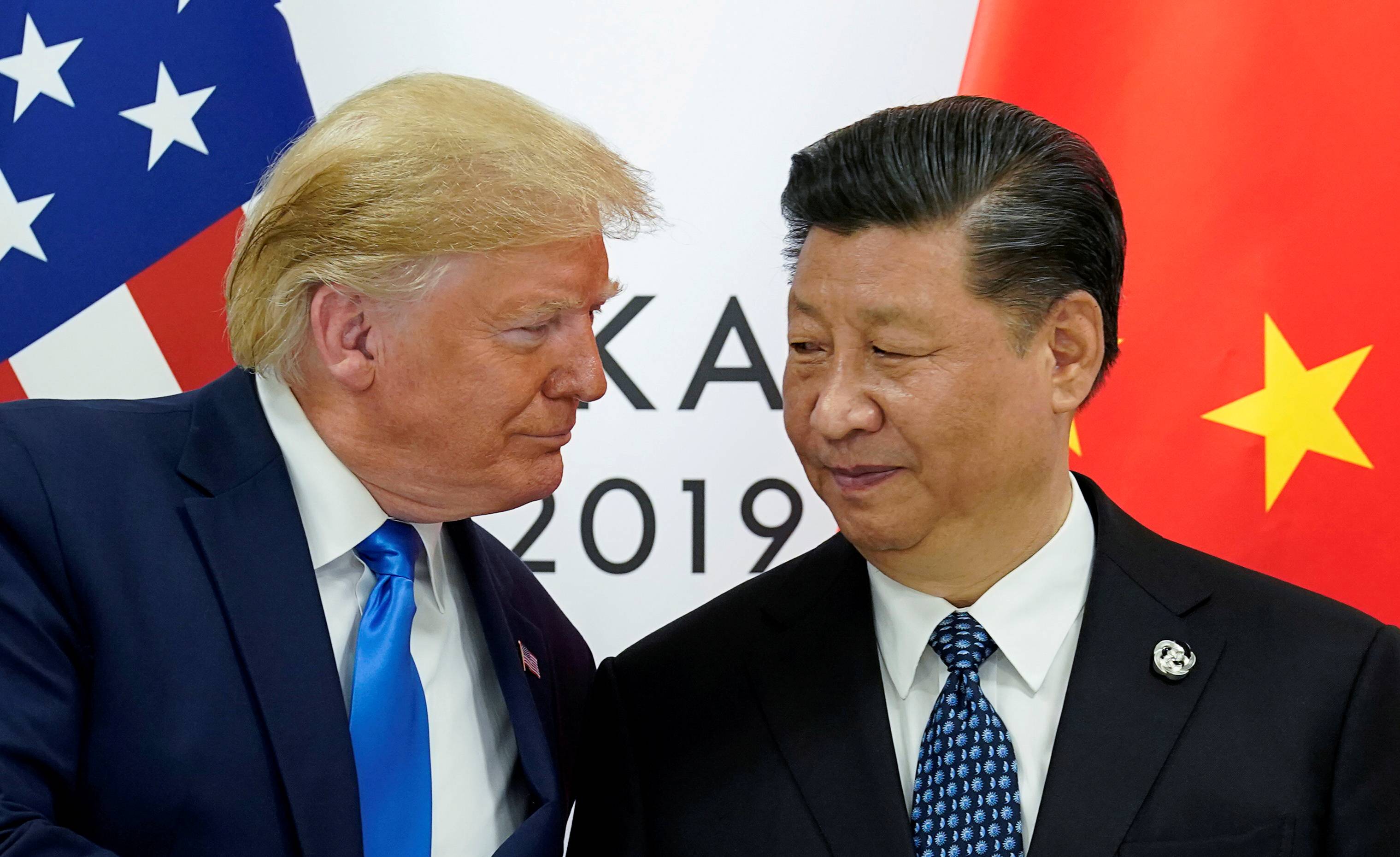 U.S. President Donald Trump meets with Chinese leader Xi Jinping at the start of their bilateral meeting at the Group of 20 leaders summit in Osaka in June 2019.  | REUTERS