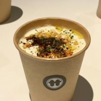 Miso cappuccino: Warm up with a cup of miso soup topped with tofu foam and additional sprinkled garnishes.  | ROBBIE SWINNERTON
