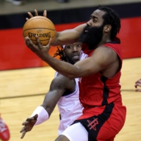 Rockets guard James Harden attempts a shot against the Lakers during their game in Houston on Jan. 10. | USA TODAY / VIA REUTERS
