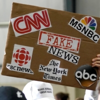 The Edelman Trust Barometer found 57% of people believe government leaders, business chiefs and journalists are spreading falsehoods or exaggerations. | REUTERS