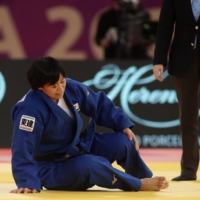 Shori Hamada sits on the mat during the women\'s 78-kg final at the World Judo Masters in Doha on Wednesday. | AFP-JIJI
