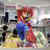 Universal Studios Japan will postpone the opening of its much-anticipated Super Nintendo World theme park due to a surge in coronavirus cases. | BLOOMBERG