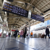 Few people stand on a platform for the Tokaido Shinkansen line at Tokyo Station on Jan. 2. | KYODO