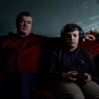 John and Cathleen Reichert watch as their son, James, plays video games at their home in Boulder, Colorado, on Friday. Children\'s screen time had doubled by May as compared with the same period in the year prior, according to Qustodio, a company that tracks usage on tens of thousands of devices used by children, ages 4 to 15, worldwide. | STEPHEN SPERANZA / THE NEW YORK TIMES