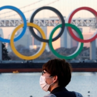 The assurances by Japan\'s chief Cabinet secretary that the Tokyo Olympics will be held this summer came after Reuters quoted the regulatory reform minister, Taro Kono, as saying the fate of the games \"could go either way.\" | REUTERS 

