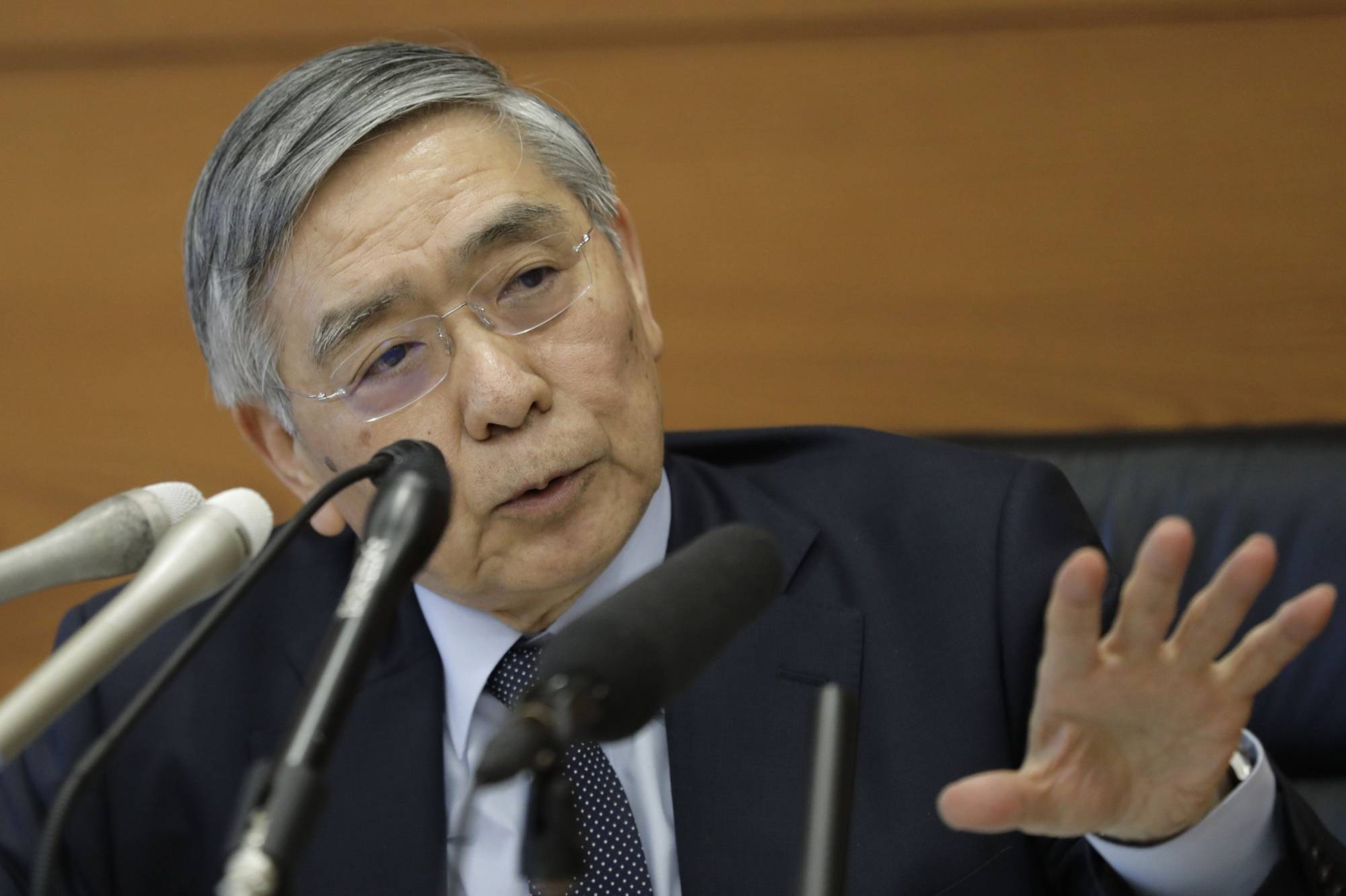 Bank of Japan Gov. Haruhiko Kuroda has stated clearly that the bank is not considering any pullback on easing. | BLOOMBERG