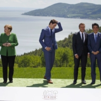 Leaders including the U.K.\'s Theresa May (left to right), Germany\'s Angela Merkel, Canada\'s Justin Trudeau, France\'s Emmanuel Macron and Japan\'s Shinzo Abe at the G7 summit in La Malbaie, Quebec, in 2018

 | BLOOMBERG 
