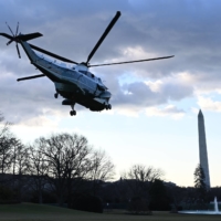 Marine One with outgoing U.S. President Donald Trump and first lady Melania Trump on board departs the White House in Washington on Wednesday. | AFP-JIJI