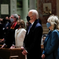 U.S. President-elect Joe Biden and his wife, Jill, attend a church service before his presidential inauguration, at St. Matthews Catholic Church in Washington on Wednesday. | REUTERS