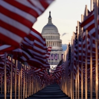 American flags line the National Mall in front of the U.S. Capitol building ahead of inauguration ceremonies for President-elect Joe Biden in Washington on Wednesday. | REUTERS